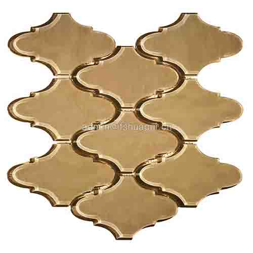 Golden water jet glass lantern mosaic backsplash